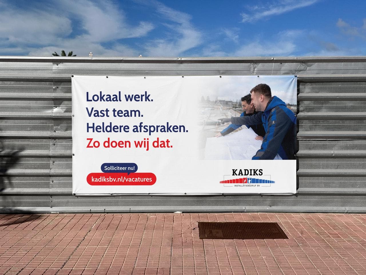 Kadiks bouwdoek recruitment banner op bouwplaats